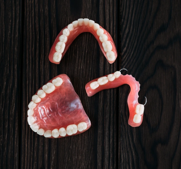 Full and partial dentures designed to restore missing teeth and improve function