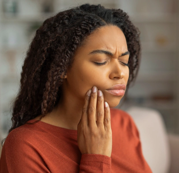 Patient experiencing a dental emergency requiring prompt treatment